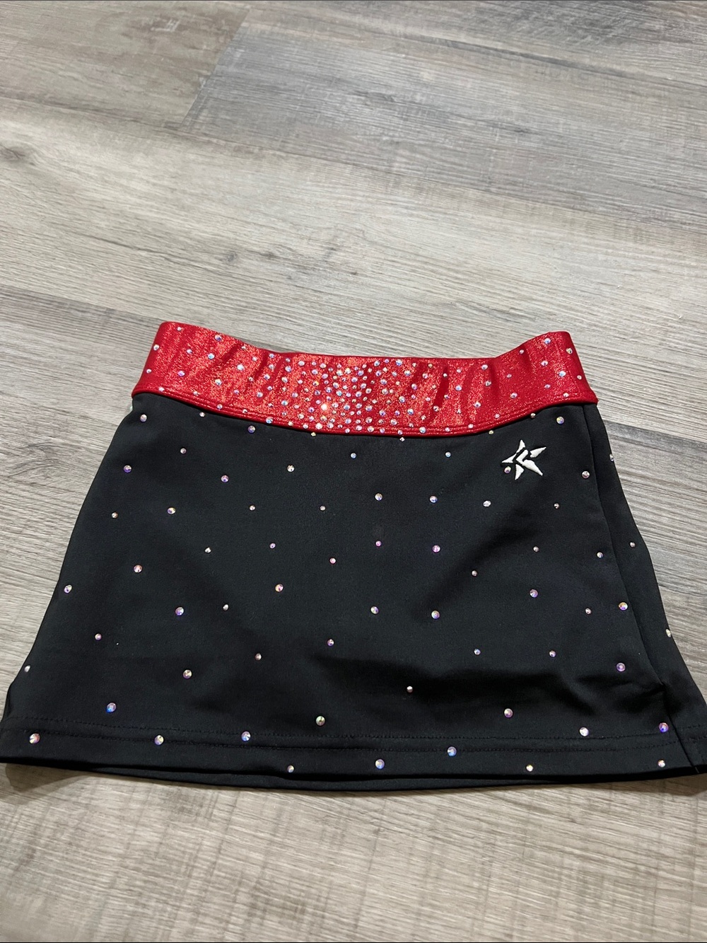 Rebel Athletic black skirt with rhinestones built in briefs and metallic red YM
